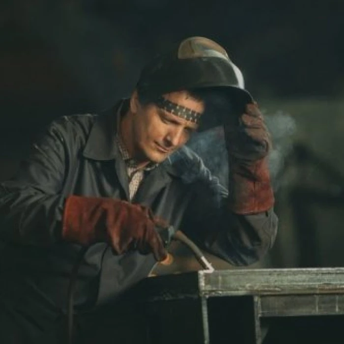 Metalworker welding a steel structure