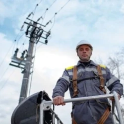 Power line technician at work