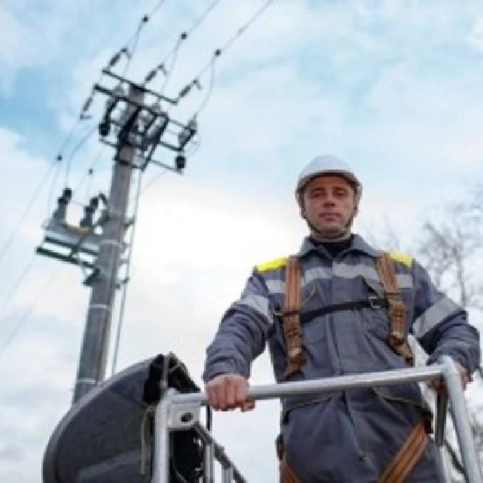 Power line technician at work